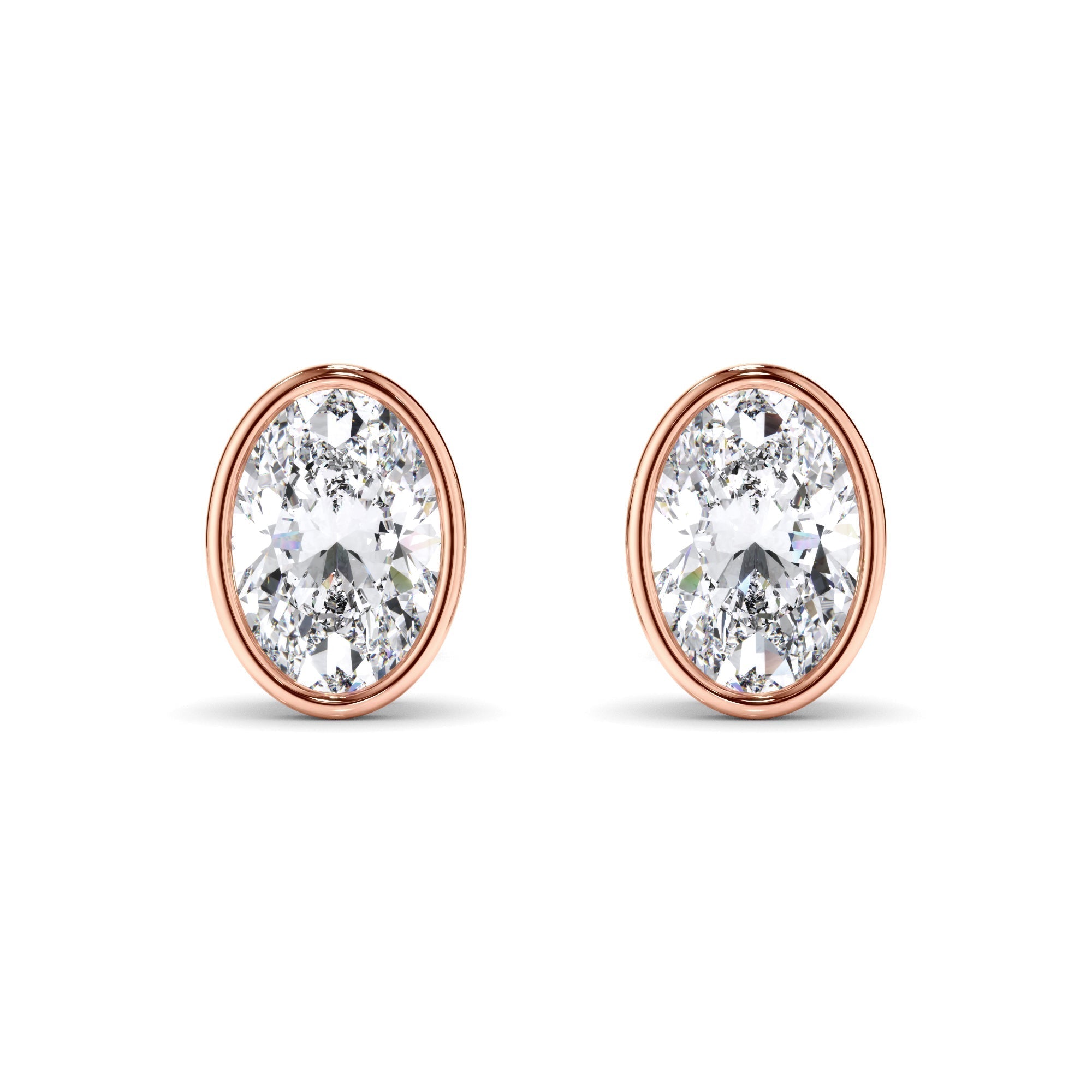 Oval Cut Diamond Bezel Set Stud Earrings